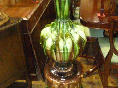 Large green/brown glazed pottery vase and stand