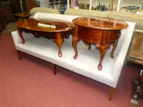 Edwardian sofa raised on six legs