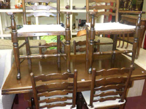 Oak draw leaf refectory dining table and five (4+1) ladder back rush seated...