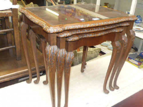Carved walnut nest of three cabriole leg tables