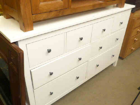 Modern cream finish chest of eight drawers