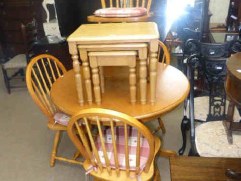 Circular pedestal kitchen table and four chairs in light oak finish and...