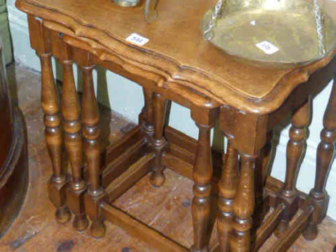 Nest of three oak turned leg coffee tables