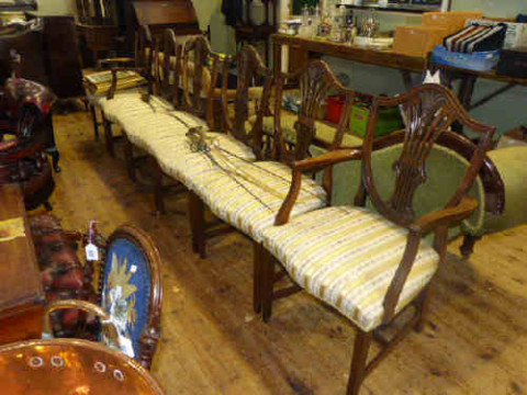 Set of six mahogany Sheraton style dining chairs, including two arm