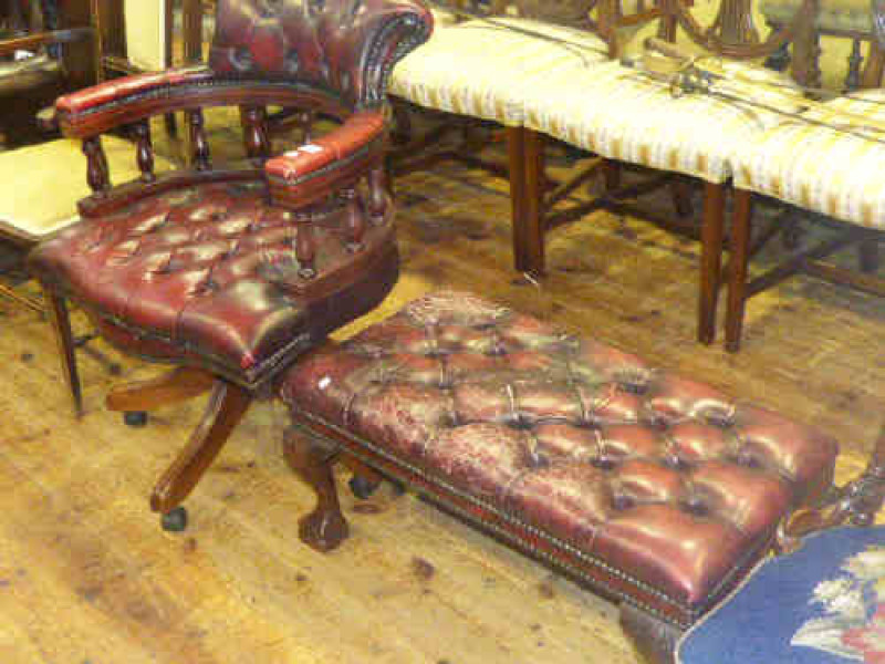 Buttoned red leather 'club' office chair and footstool (2)