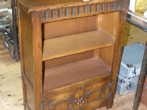 Small oak open bookcase with double door cupboard