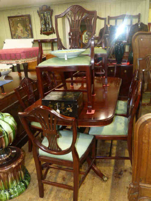 Mahogany dining room suite with extending table and eight chairs