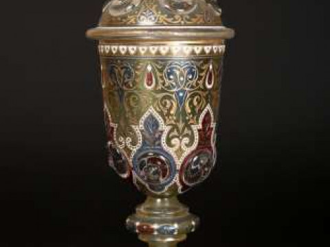 A large Bohemian glass covered goblet, the cover and body moulded with...