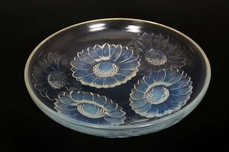 Vernon', a Lalique bowl, moulded to the exterior with Sunflower heads, moulded R. LALIQUE FRANCE mark. Diameter 21.5cm