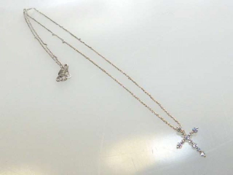 18ct white gold and diamond cross pendant, set with eleven two claw set diamonds, on a fine chain, length 43cm