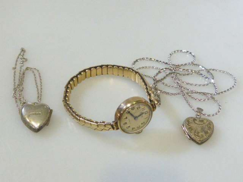 Avia 9ct gold wrist watch, with hallmarked expanding bracelet strap; silver locket, etc