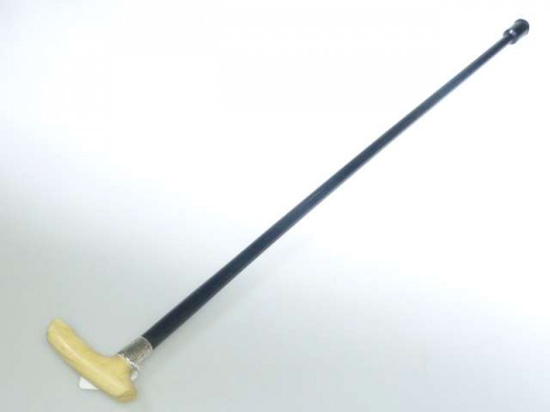 Ivory handled and ebonised cane, the collar dated 1885