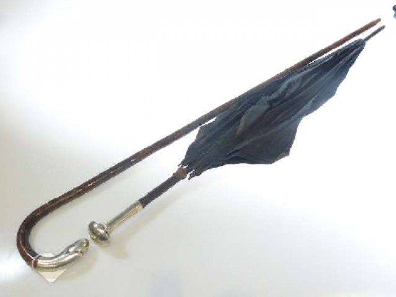 Silver handled and bamboo moulded cane; and a silver handled parasol (2)
