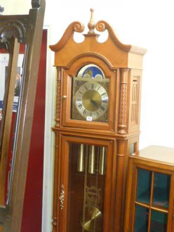 Modern triple weight longcase clock having arched moon phase dial