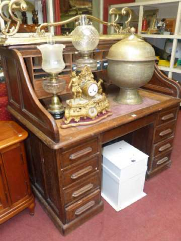 S-shaped oak double pedestal roll top desk