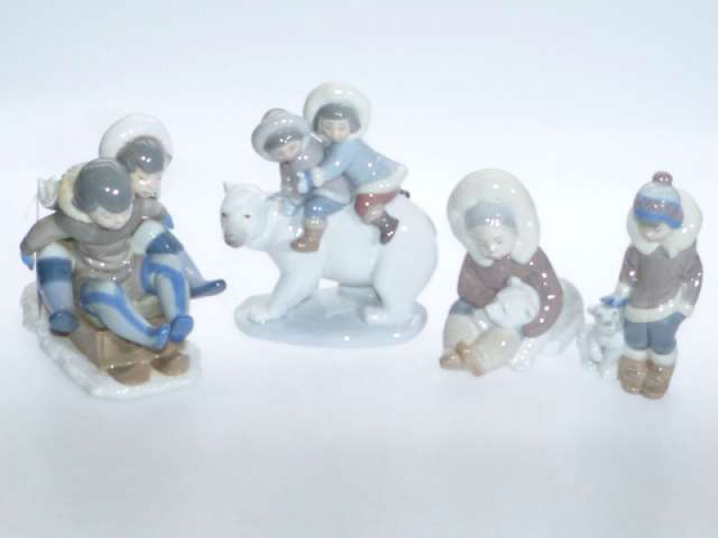 Collection of four Lladro Eskimo children groups