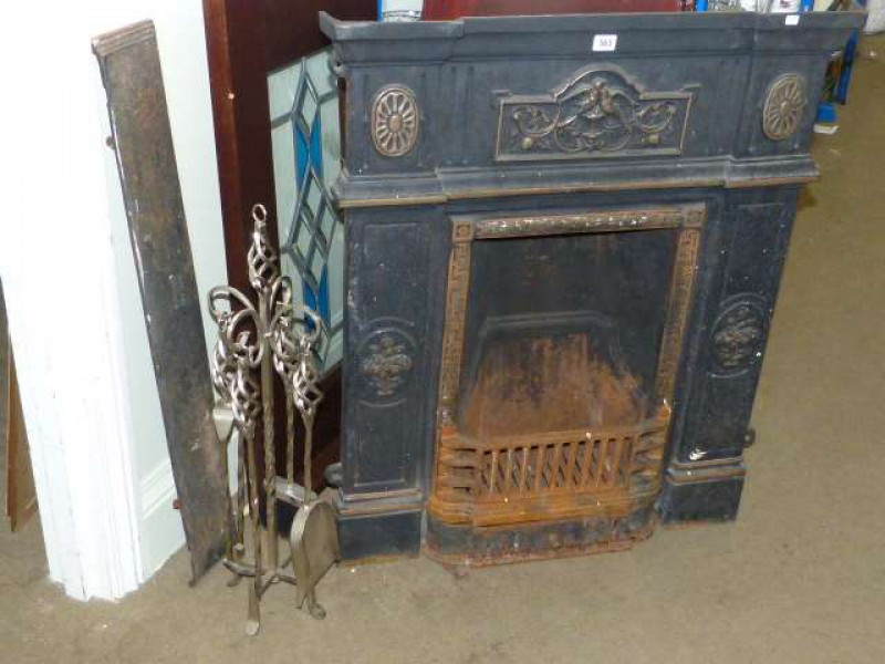 Cast iron bedroom fireplace and wrought metal companion set