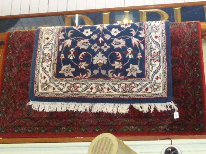 Red ground Keshan rug 2.00 x 1.40 and blue ground Kahshan rug 1.60 x 0.95 (2)