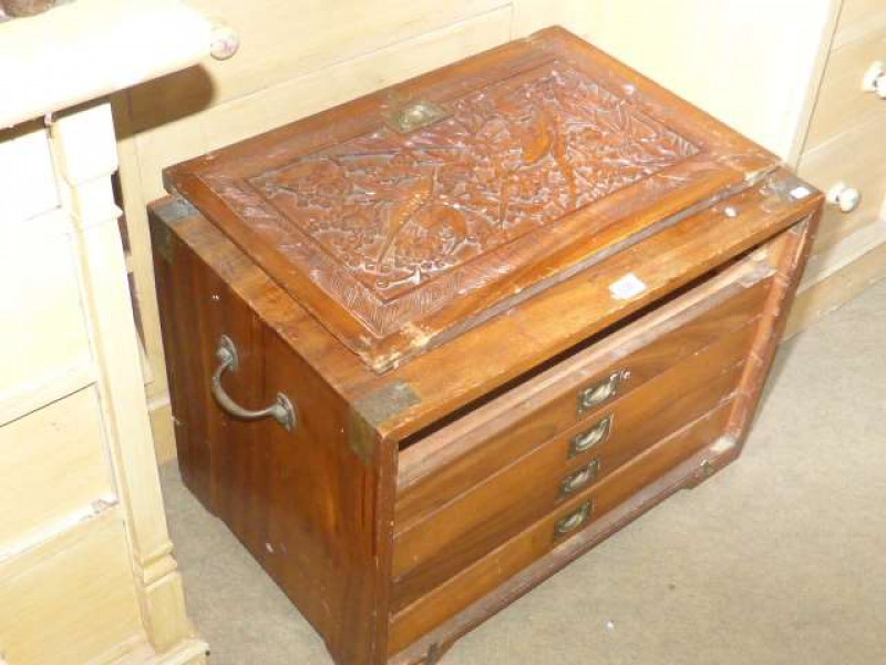 Carved Eastern four drawer table cabinet