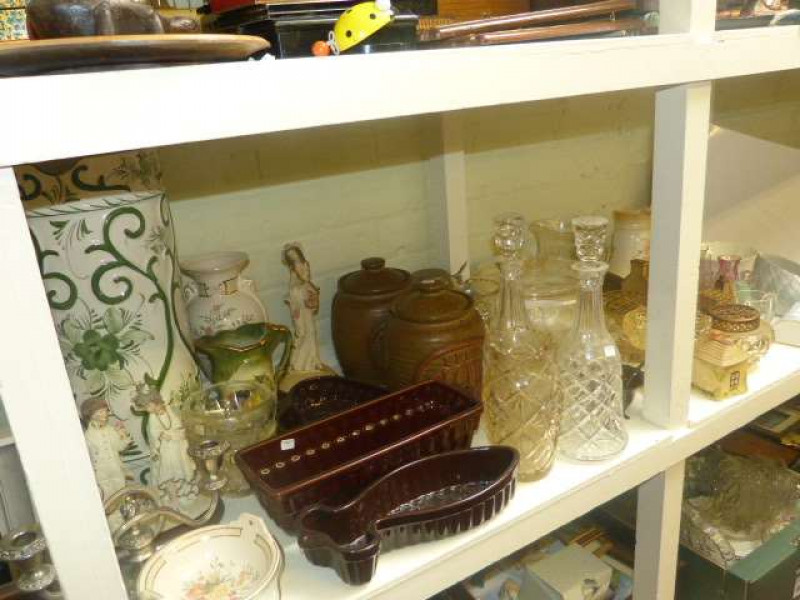 Pair of glass decanters and glassware, pottery stick stand, figures, storage jars, etc