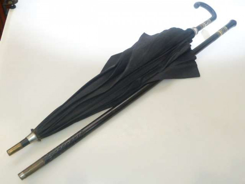 Indian ivory mounted in ebony handled sword stick and umbrella