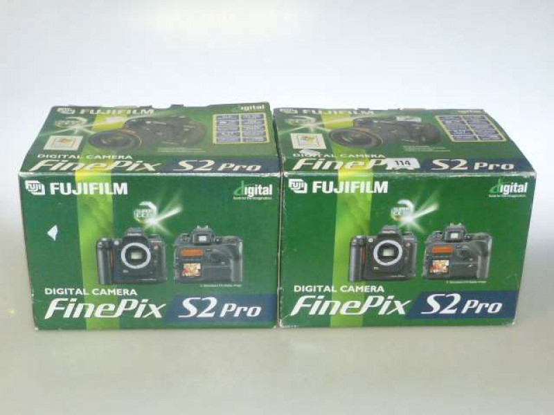 Two Fujifilm Finepix S2 Pro cameras, one with lens