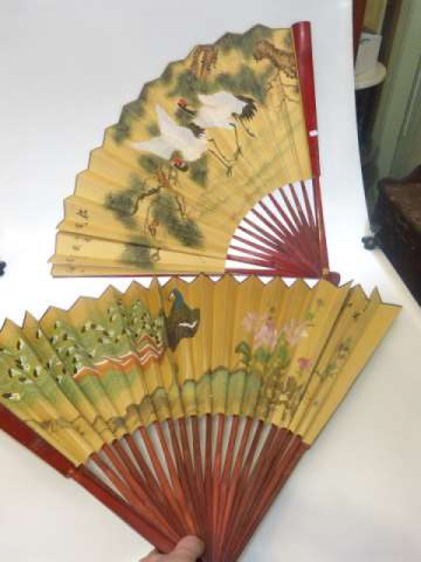 Pair of large oriental wood and paper fans with exotic bird and floral design