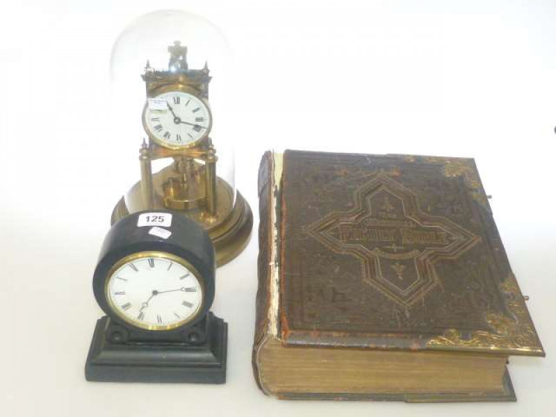 Anniversary clock under dome, small slate mantel clock and 19th Century family bible