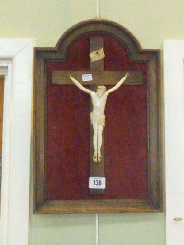 Oak framed crucifix with ivory figure of Christ