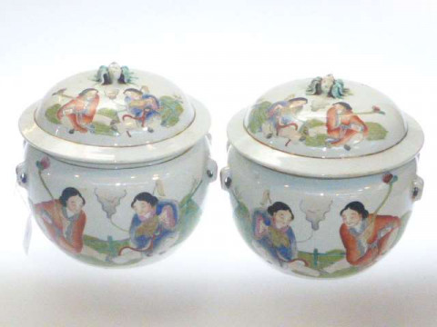 Pair of Chinese lidded jars each with figure and verse decoration