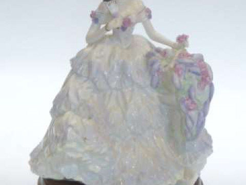 Coalport celebration of the seasons 'Lilac Time' figure on wood plinth