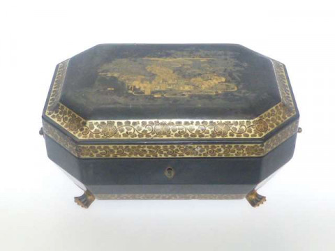 19th Century lacquered sewing box raised on paw feet with ivory fittings