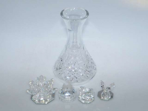 Waterford crystal wine carafe and four pieces of Swarovski crystal