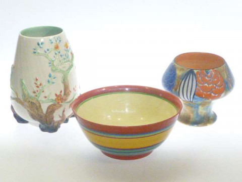 Three pieces of Clarice Cliff pottery, two vases and bowl