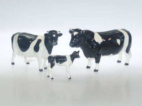 Beswick Friesian bull, cow and calf