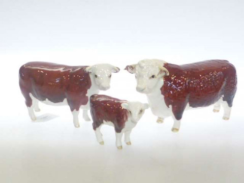 Beswick Hereford bull, cow and calf