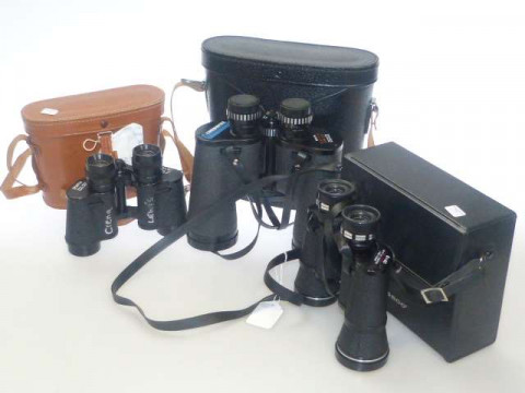 Three pairs of cased binoculars