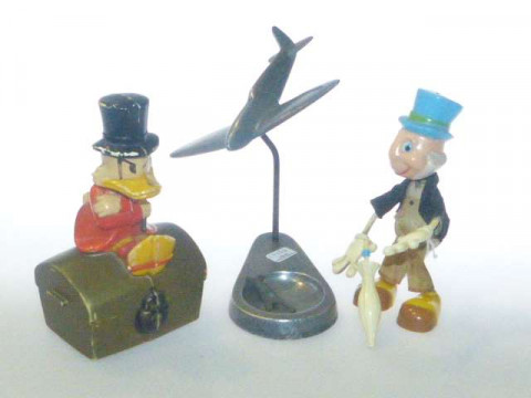 Two Disney figures and pewter spitfire ashtray