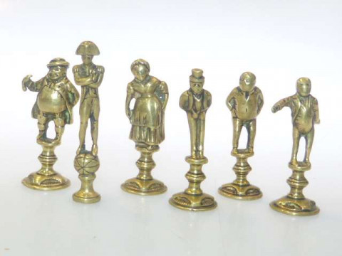 Set of six brass figure seals