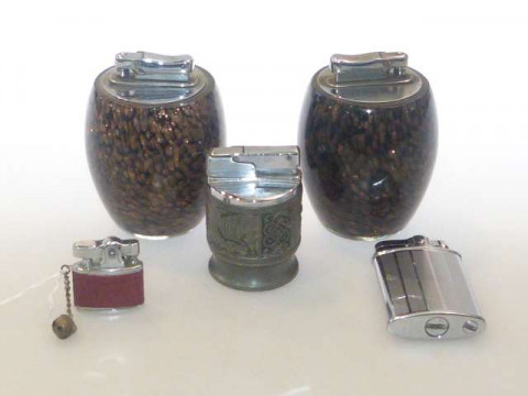Three table lighters and two pocket lighters