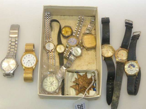 Collection of wristwatches and three star medals