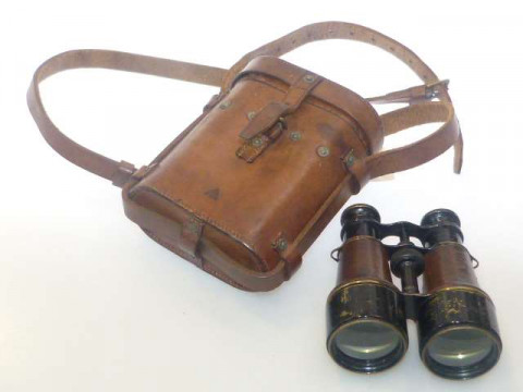 Pair of military issue binoculars with leather case inscribed MK V WIDE...