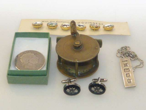 Silver ingot on chain, set of six Guinness buttons, small brass fishing...