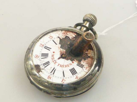 WWI 'Wille Freres' pocket watch with bullet round penetrating the enamelled...