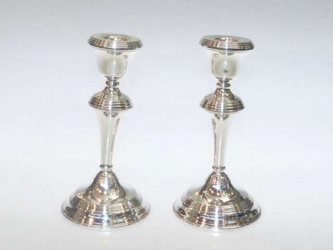 Pair of silver loaded candlesticks, Birmingham 1961