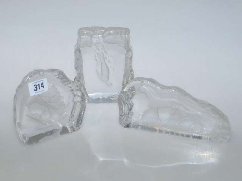 Three Continental glass paperweights engraved with horses, eagle and diving...