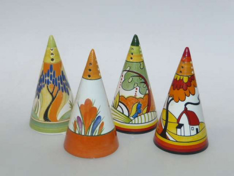 Four Clarice Cliff conical sugar sifters