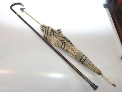 Victorian parasol with silver ducks head handle and partridge wood silver...