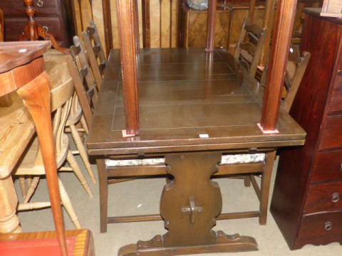 Ercol draw leaf dining table and four ladder back chairs