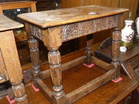 Jointed carved oak stool